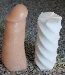Tenga Swirl next to a mold of my penis